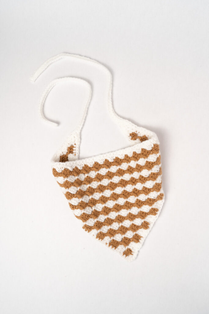 an image of a brown crochet hair scarf