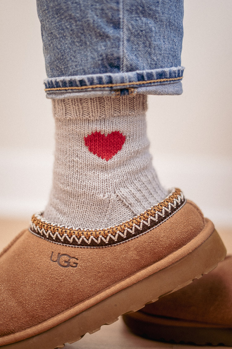 Side view of knitted heart socks with slippers – soft and warm for a handmade touch.