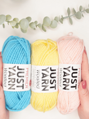 three colors of premier just yarn worsted yarn from dollar tree