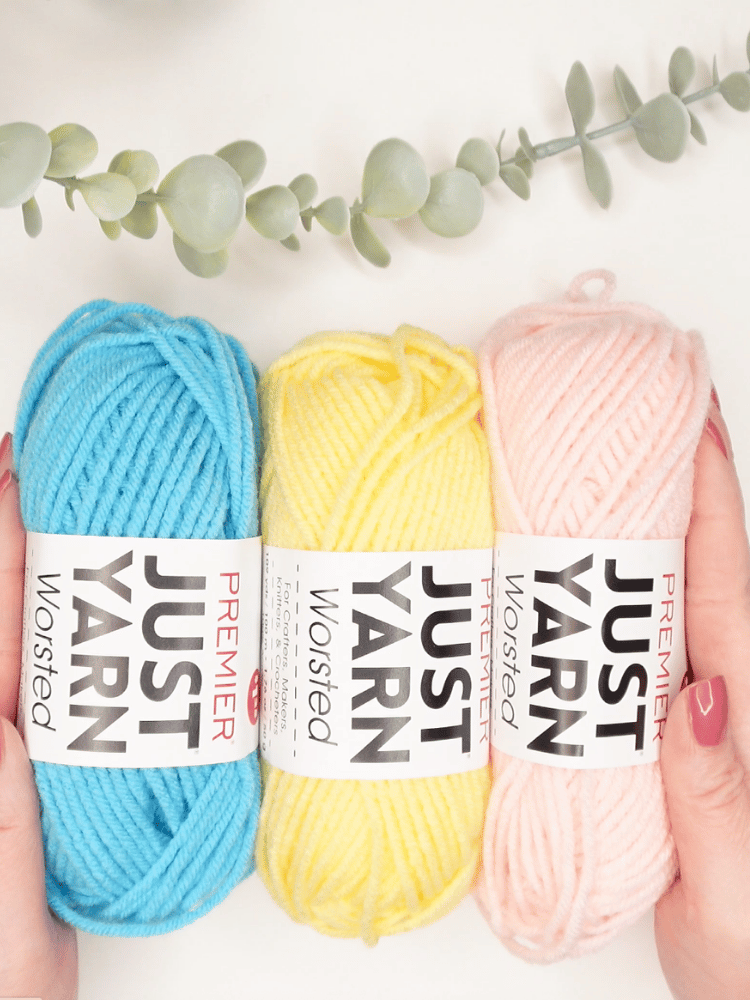 three colors of premier just yarn worsted yarn from dollar tree